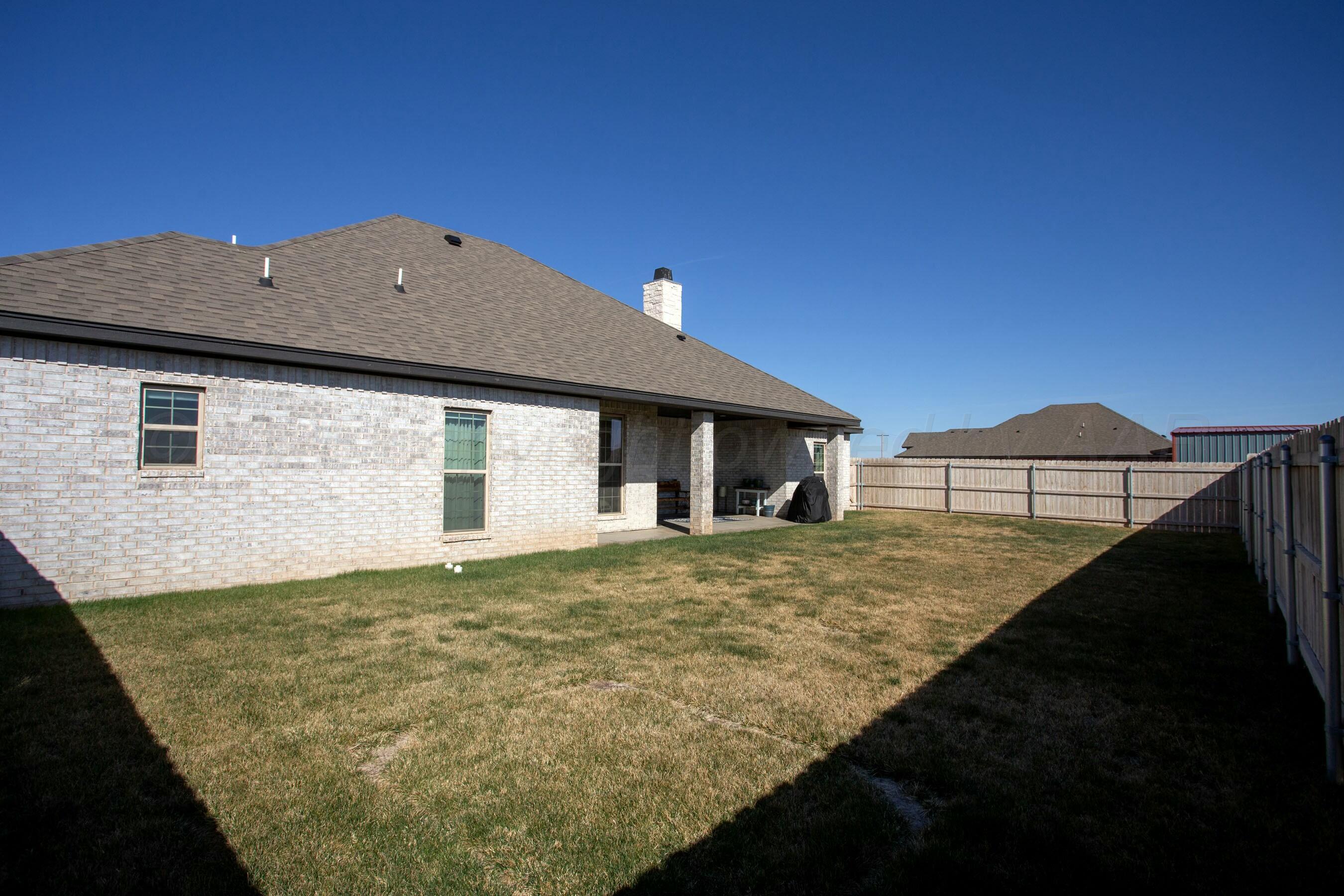 18501 Helium Road Canyon, TX 79015 - Photo 27 of 28 a house view with a garden space
