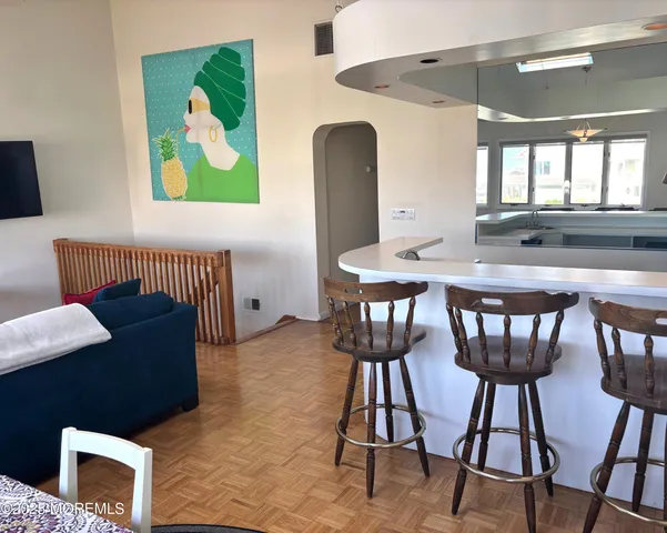 a en suite bathroom with a sink and a mirror