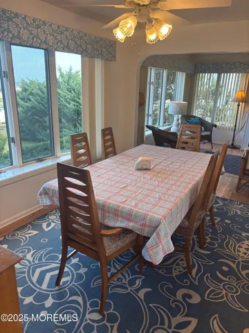 a kitchen with stainless steel appliances granite countertop a sink and a stove