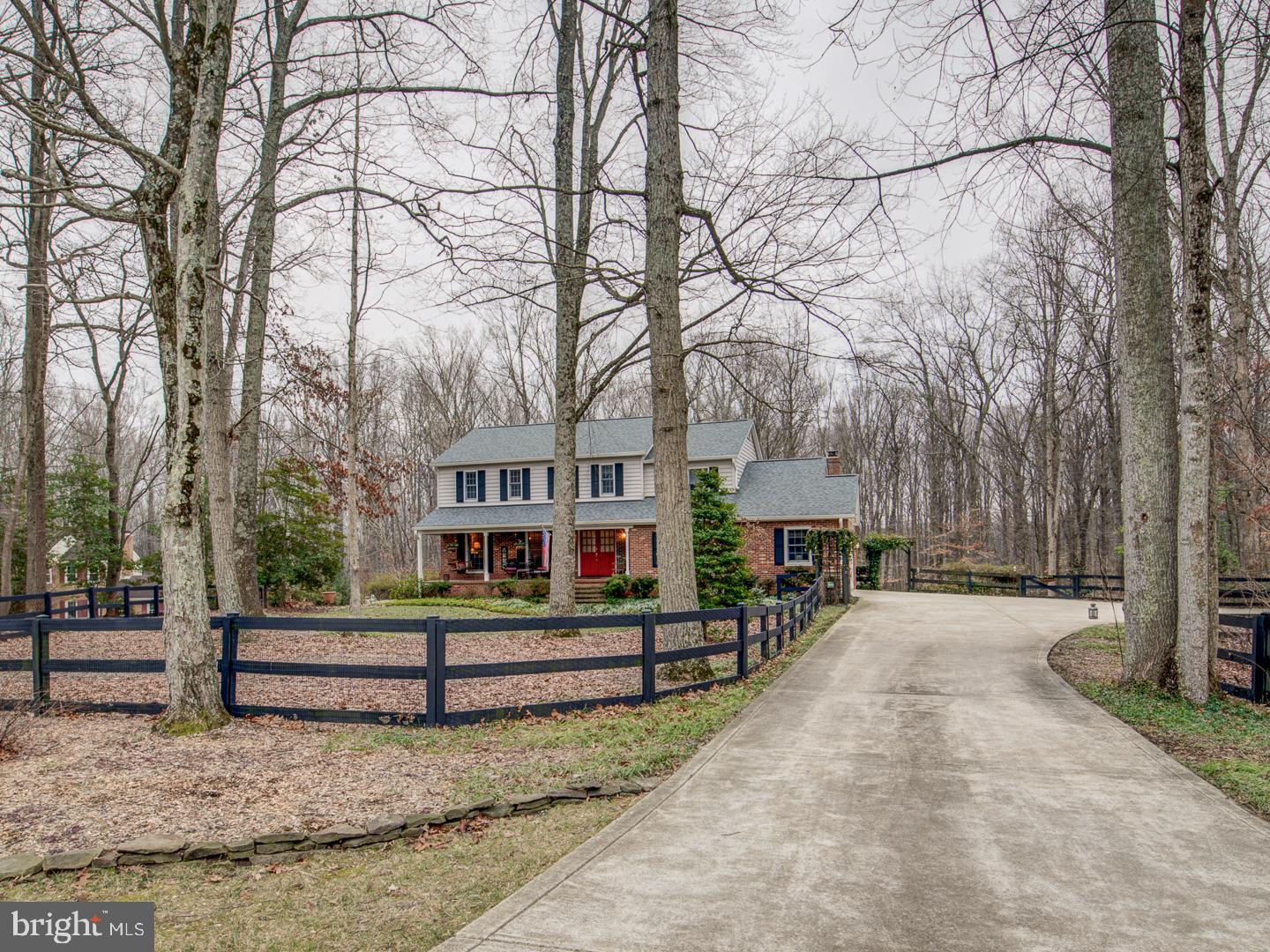 7360 Clifton Road Clifton, VA 20124 - Photo 2 of 72 large driveway with split rail fence front