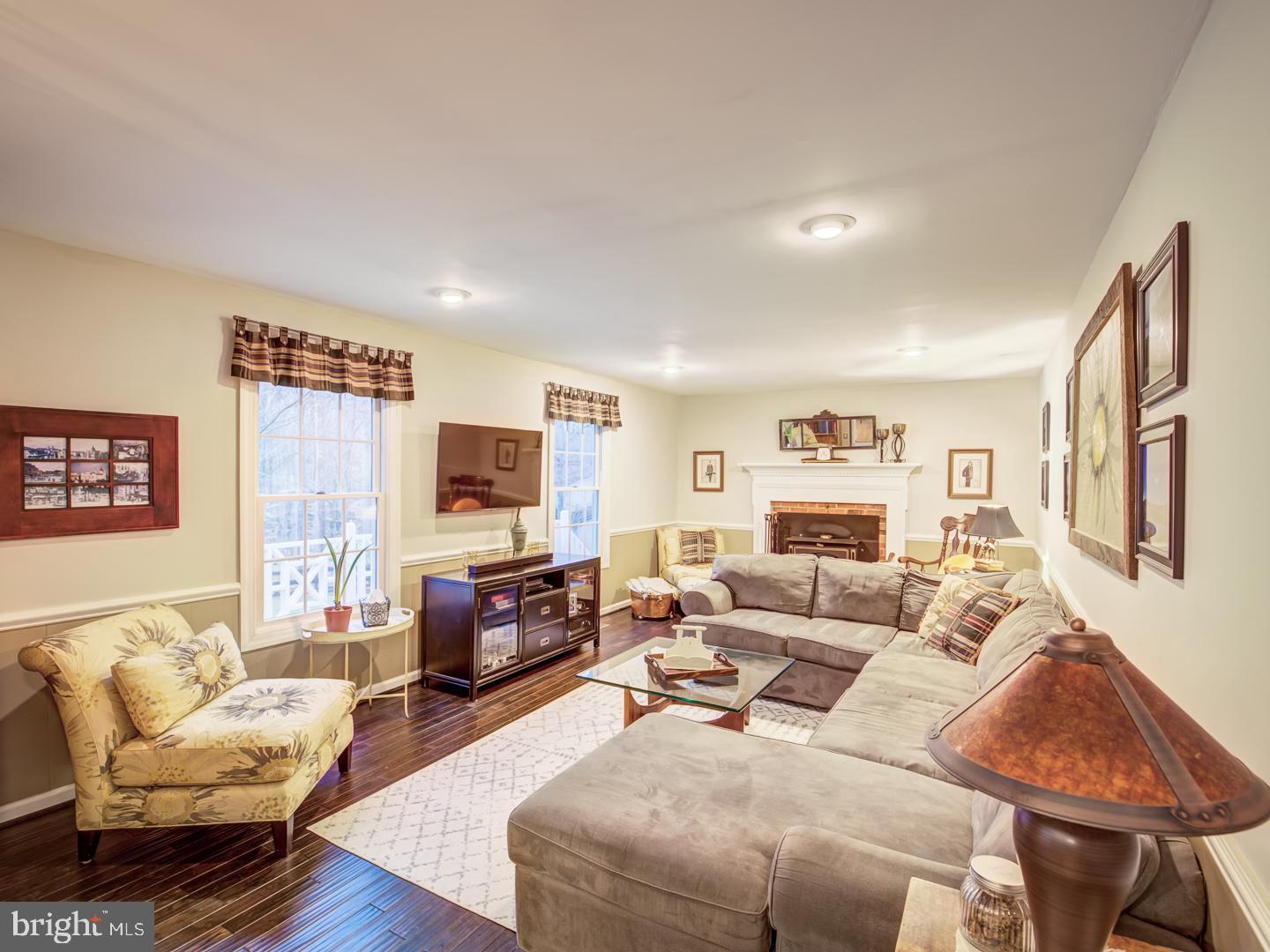 7360 Clifton Road Clifton, VA 20124 - Photo 28 of 72 step down to a spacious family room