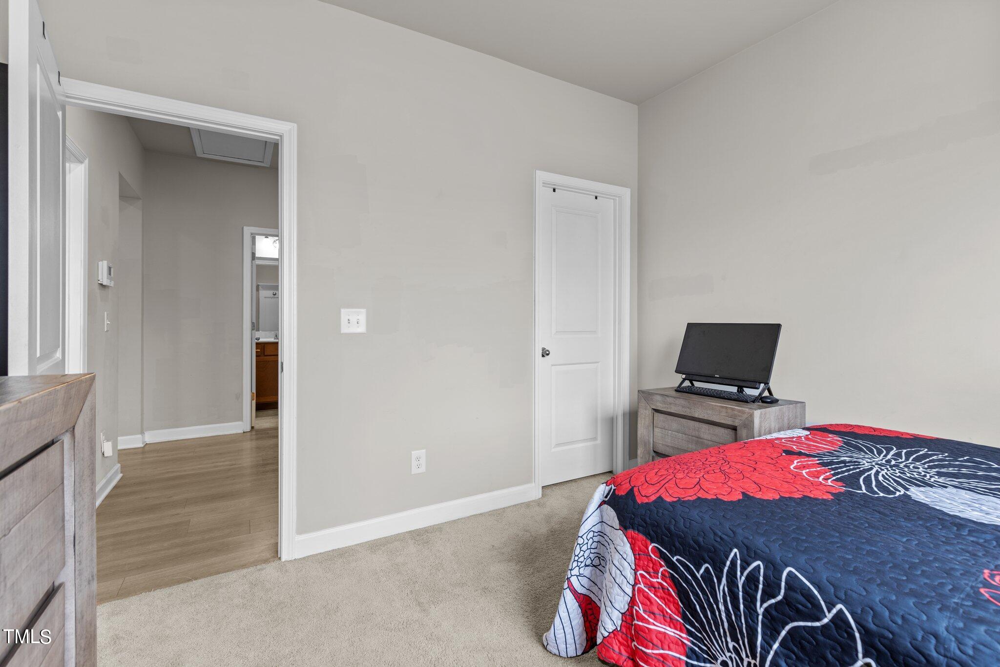36 Mae Court Roxboro, NC 27573 - Photo 24 of 34 a bedroom with a bed and a dresser