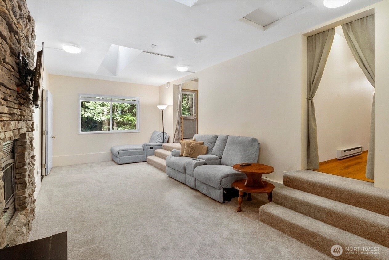 7036 Rainier Way Glacier, WA 98244 - Photo 12 of 31 a living room with furniture and a large window