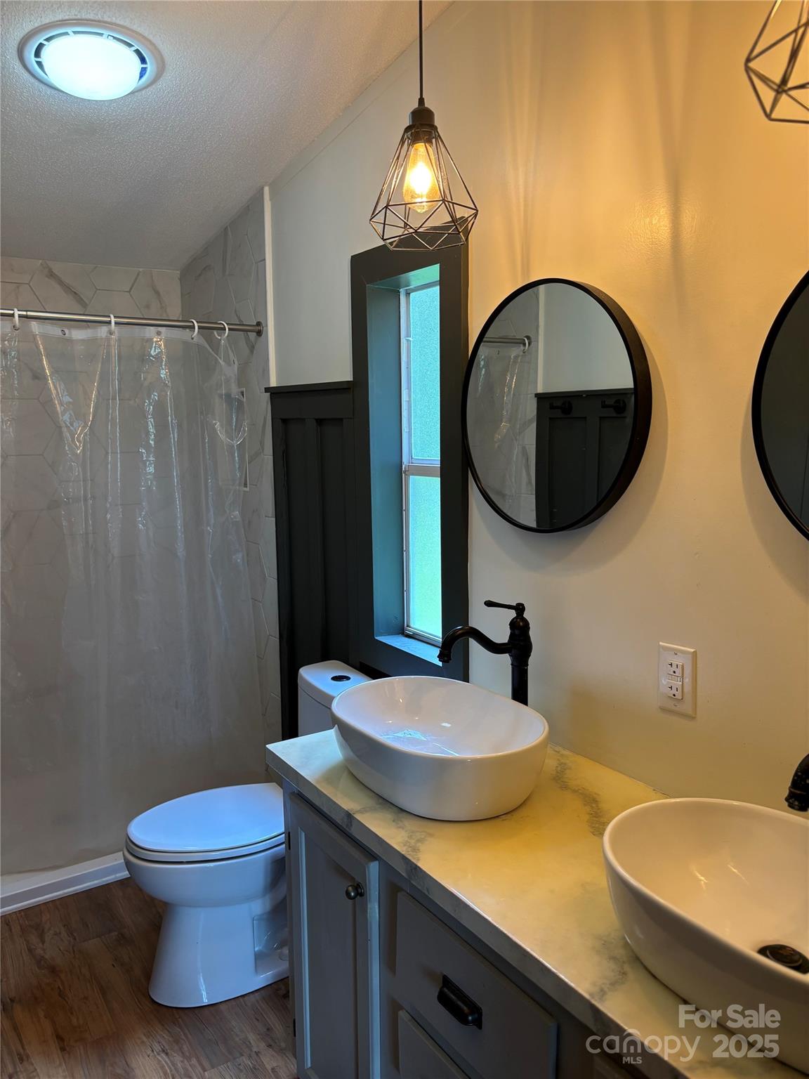 1042 Bart Thurman Road Mount Croghan, SC 29727 - Photo 14 of 16 a bathroom with a granite countertop sink and a mirror