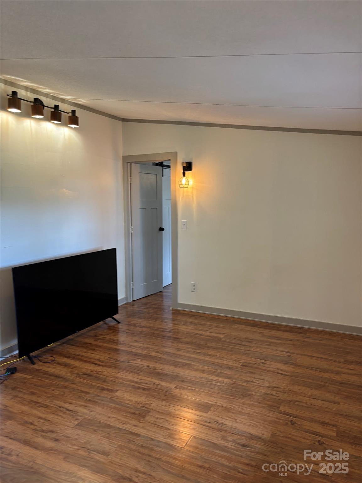 1042 Bart Thurman Road Mount Croghan, SC 29727 - Photo 2 of 16 a view of empty room with wooden floor