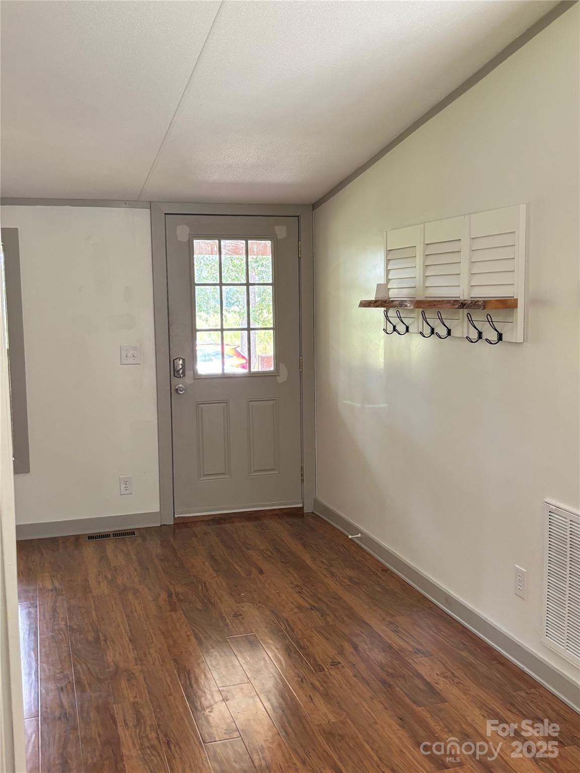 1042 Bart Thurman Road Mount Croghan, SC 29727 - Photo 4 of 16 wooden floor in an empty room with a window