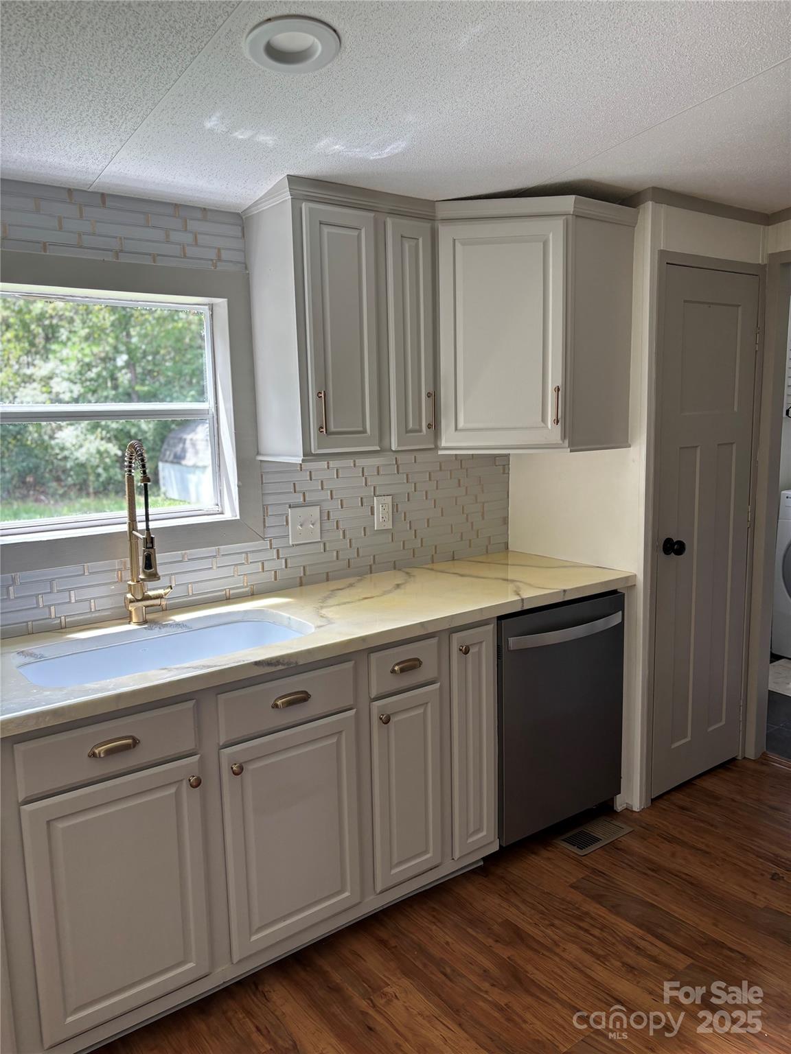 1042 Bart Thurman Road Mount Croghan, SC 29727 - Photo 8 of 16 a kitchen with a sink and cabinets