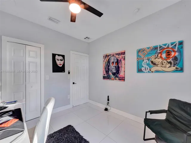 a view of a livingroom with a workspace