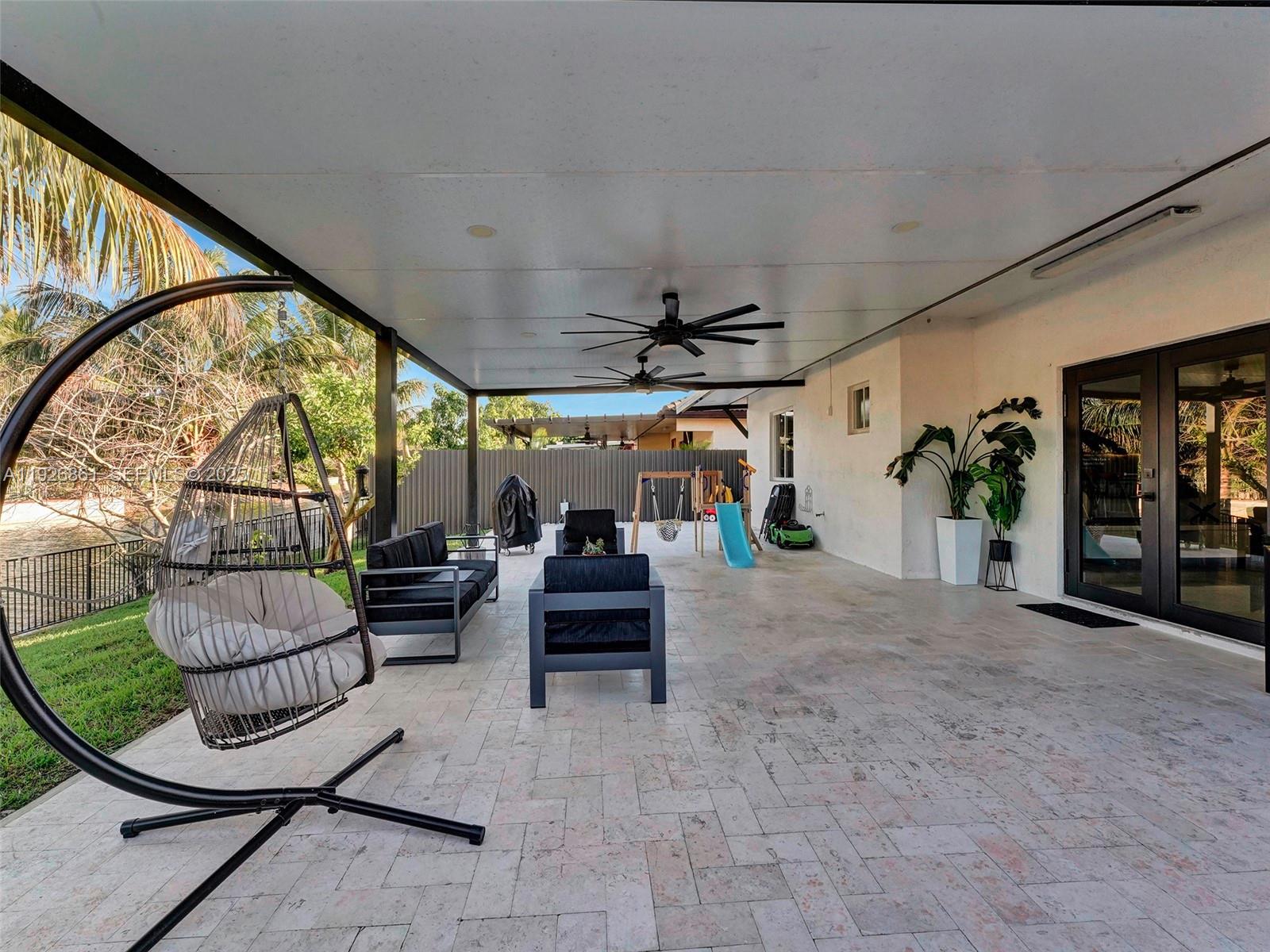 19901 Northwest 77th Court Hialeah, FL 33015 - Photo 40 of 50 a view of living room filled with furniture and furniture
