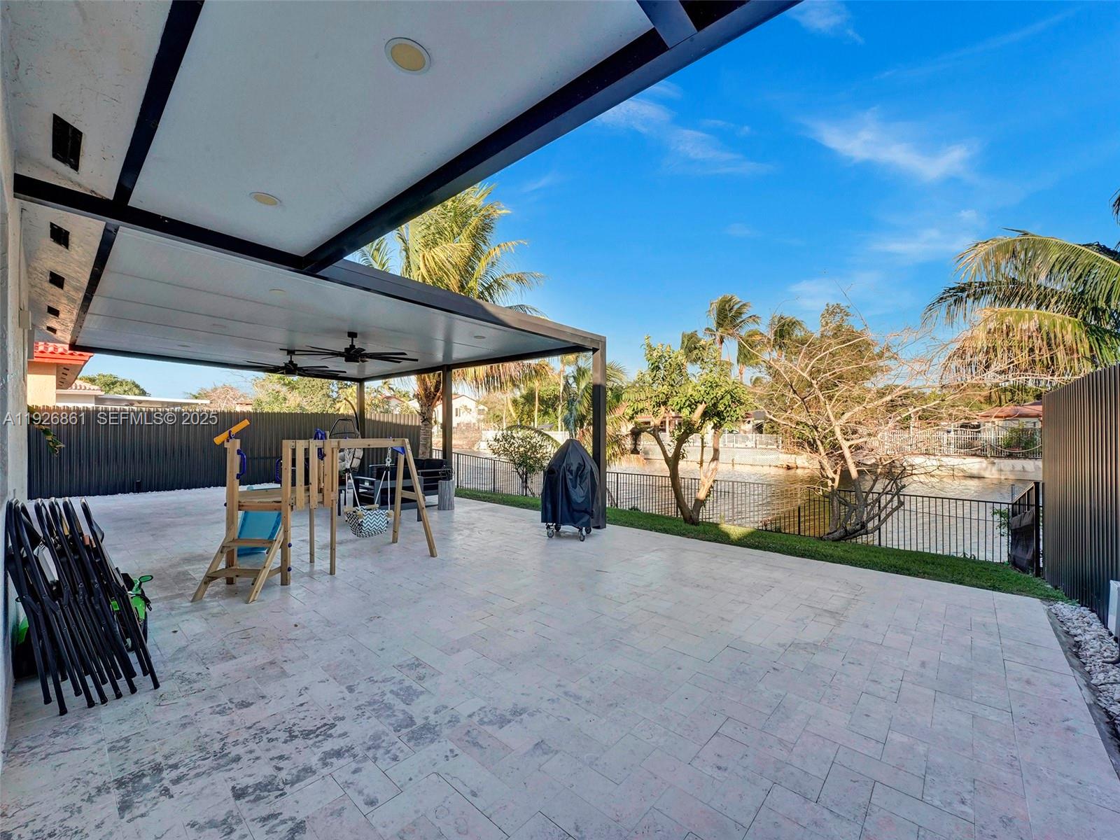 19901 Northwest 77th Court Hialeah, FL 33015 - Photo 43 of 50 a view of outdoor space and porch