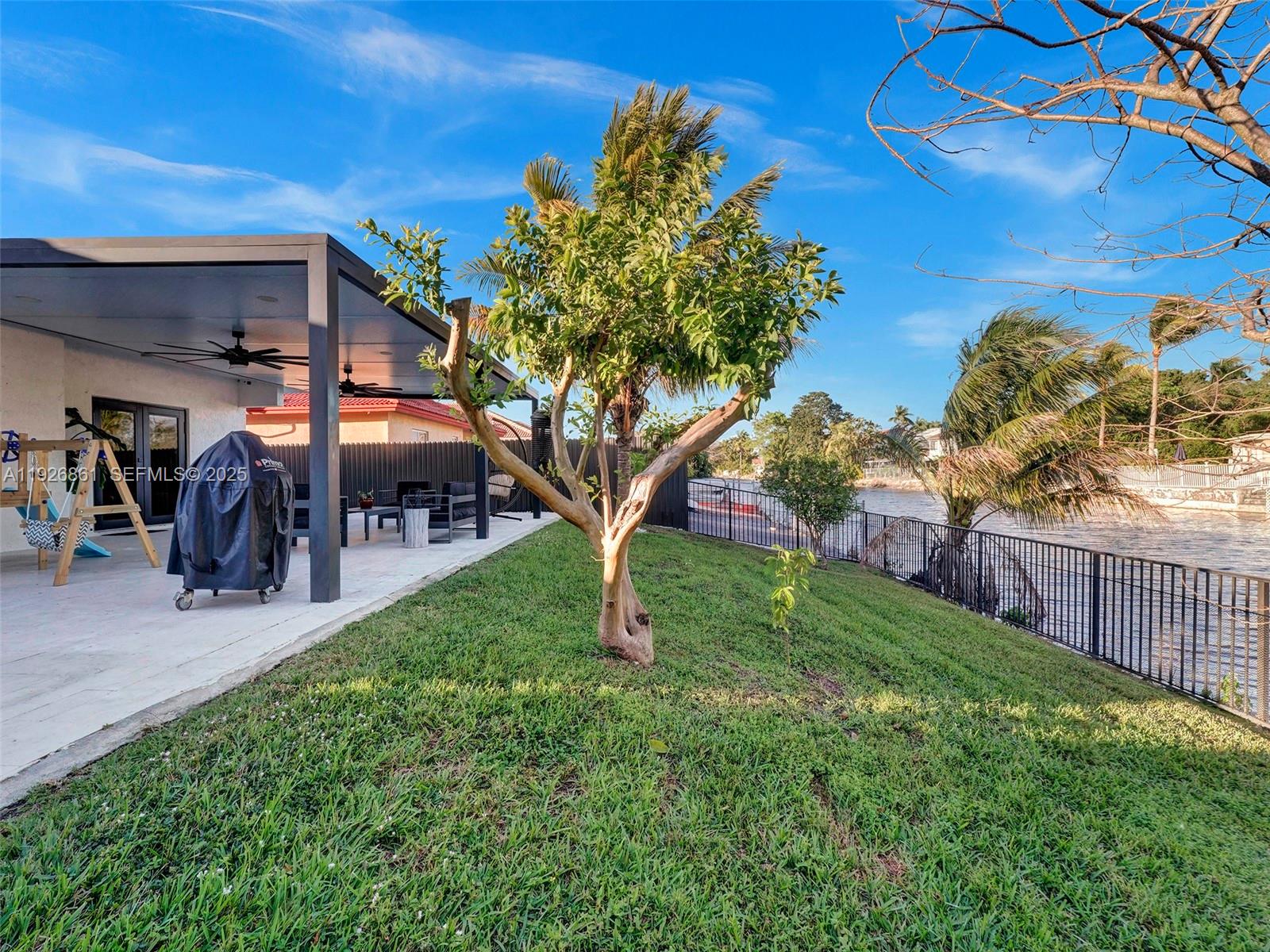 19901 Northwest 77th Court Hialeah, FL 33015 - Photo 48 of 50 a view of a backyard