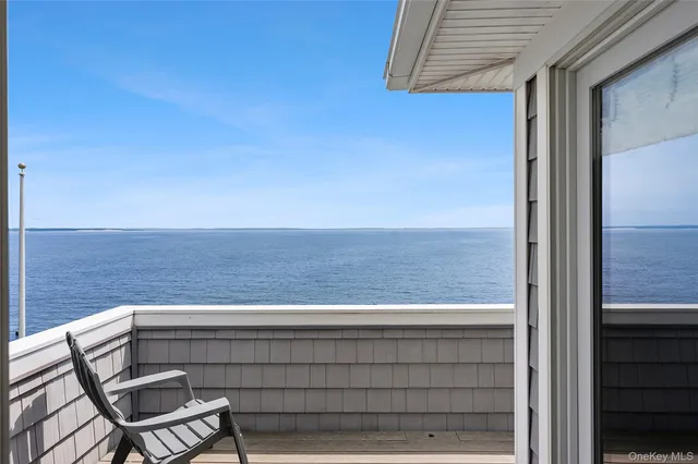 a view of a chair in the balcony