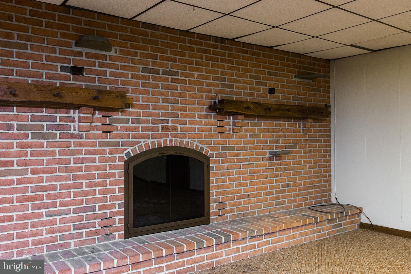 383 Stevens Road Stevens, PA 17578 - Photo 56 of 72 Lower Level - Wood Burning Fireplace