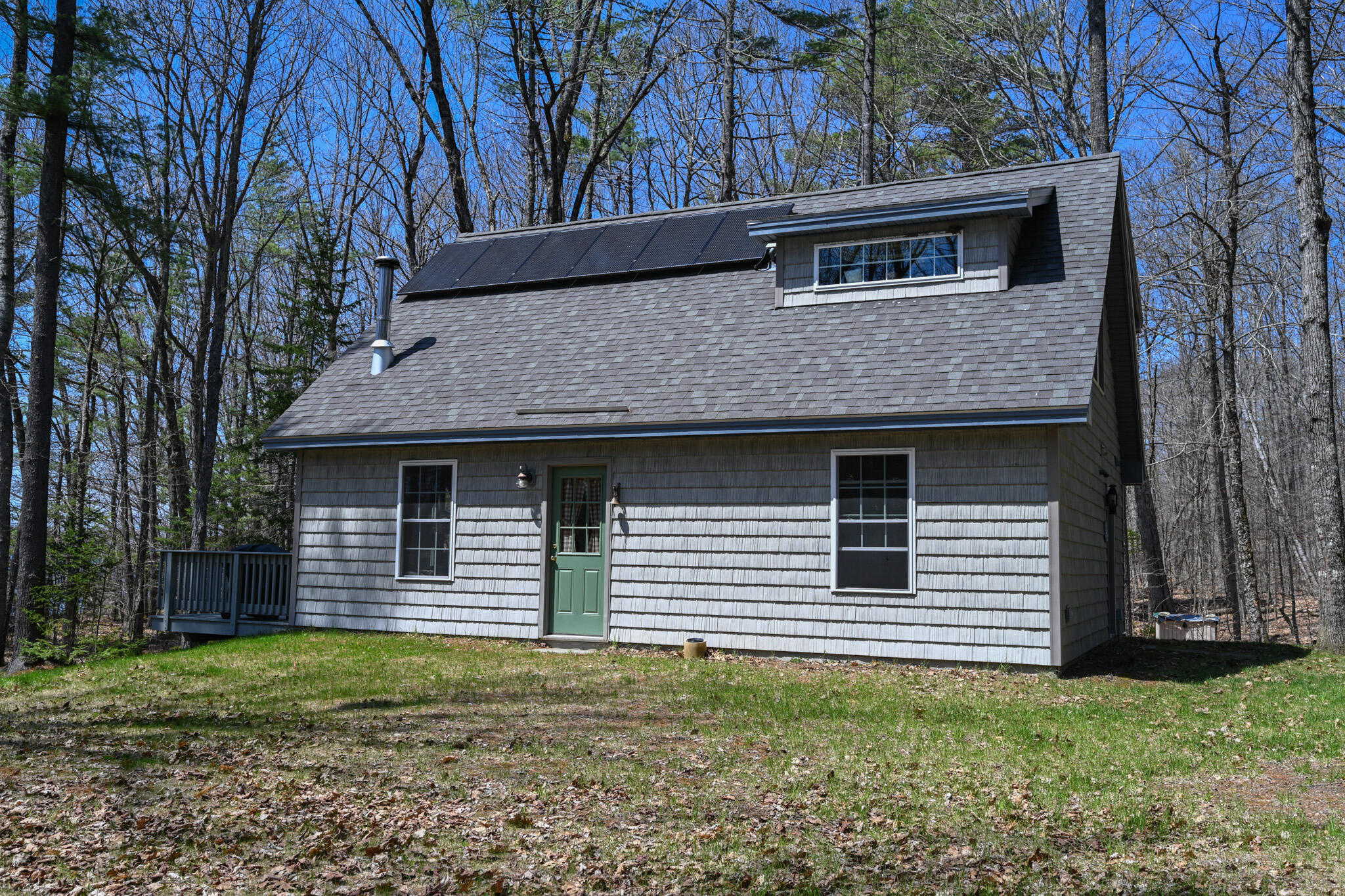 1 Loon Cove Carmel, ME 04419 - Photo 29 of 32 Side of Cottage & Solar Panels