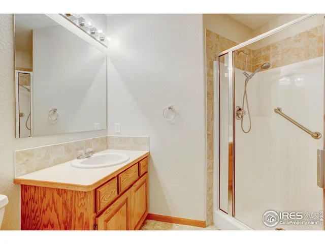 a view of a room with wooden walls