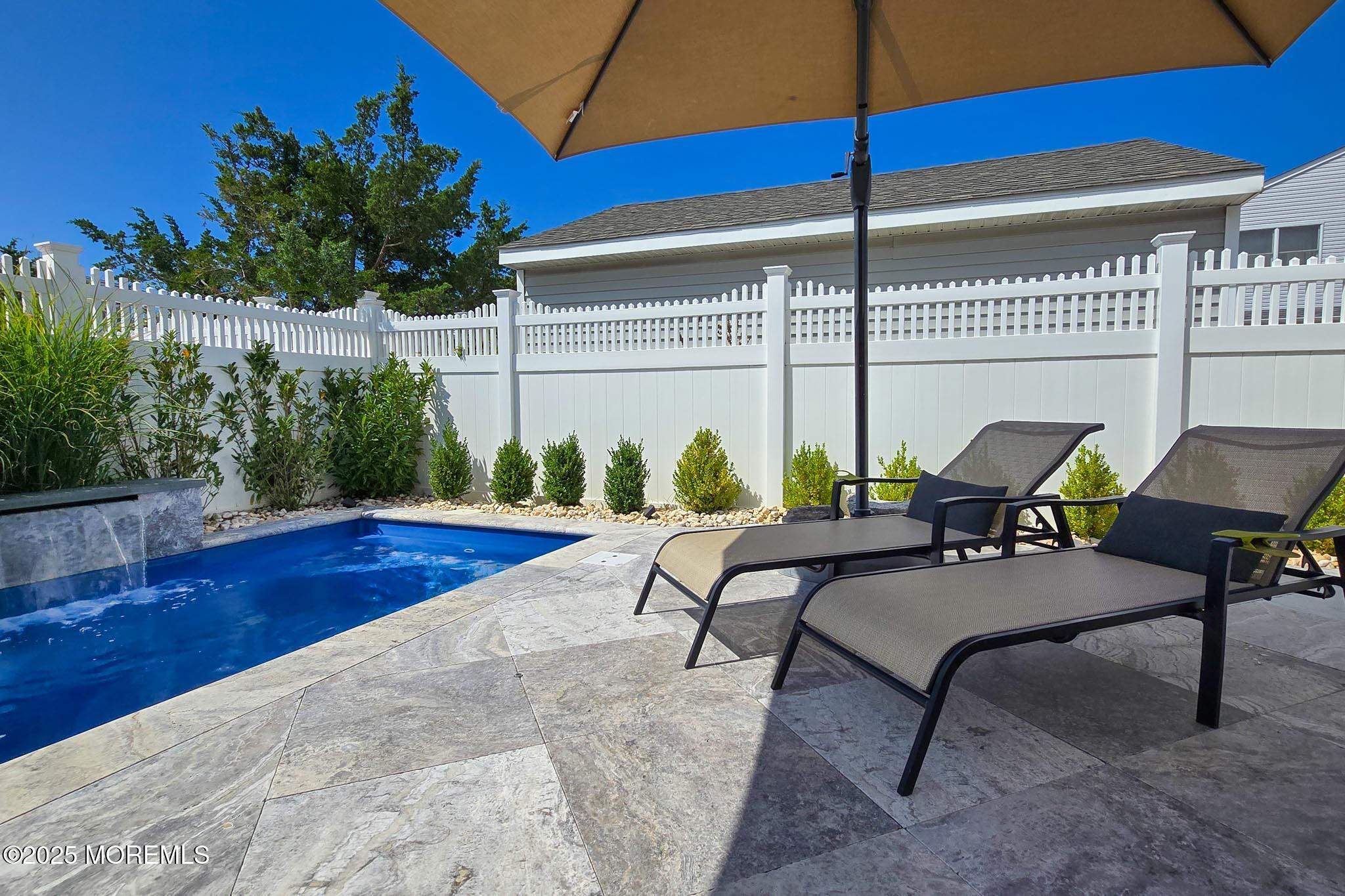 1604 Baltimore Avenue Lavallette, NJ 08735 - Photo 12 of 76 a view of a chairs and table in patio