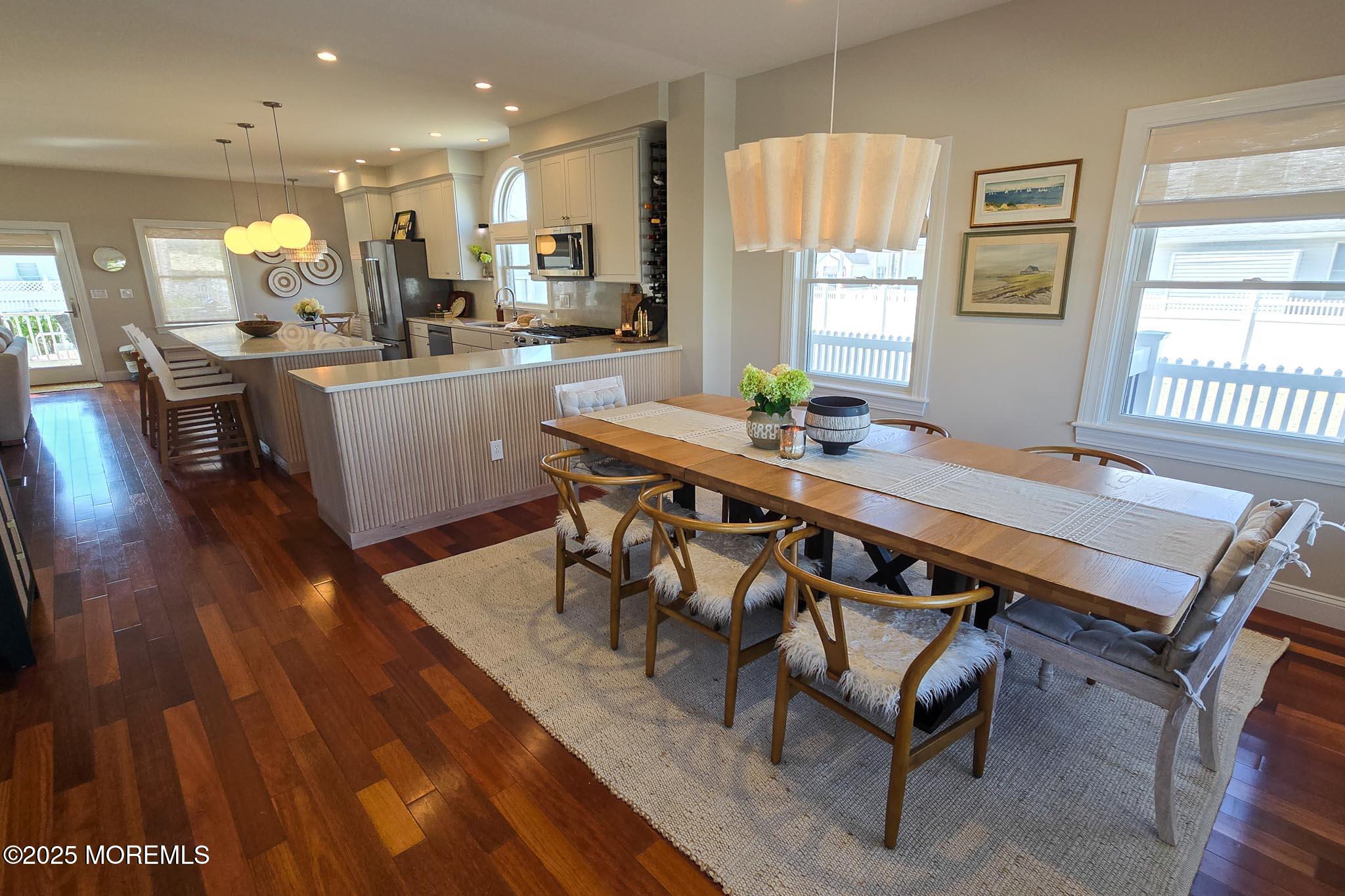 1604 Baltimore Avenue Lavallette, NJ 08735 - Photo 17 of 76 a view of a dining room with furniture window and wooden floor