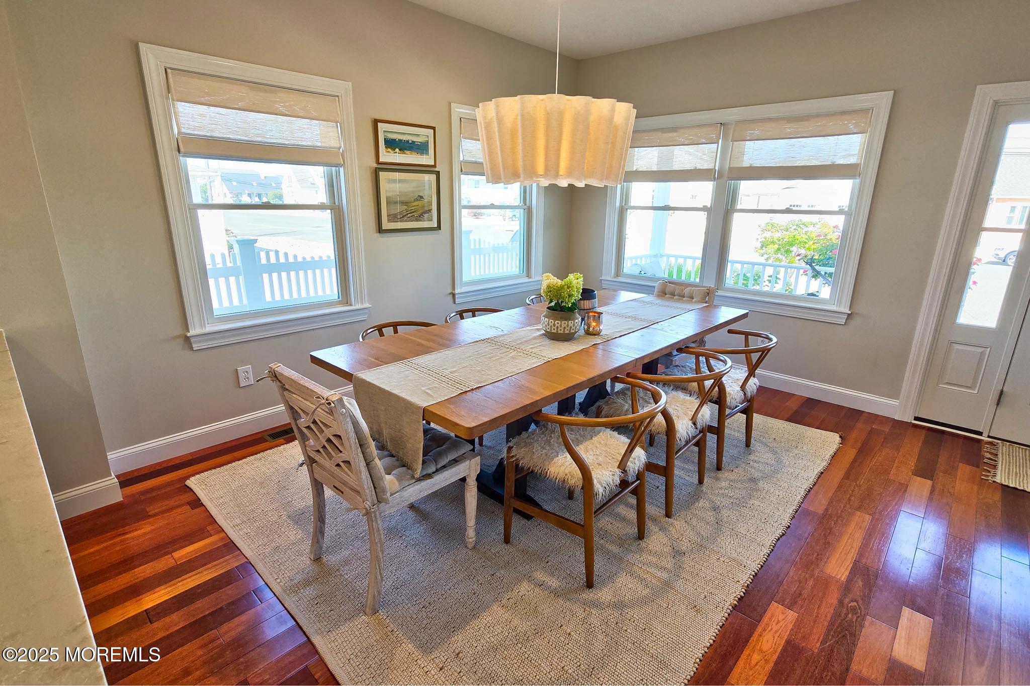 1604 Baltimore Avenue Lavallette, NJ 08735 - Photo 18 of 76 a view of a dining room with furniture window and wooden floor