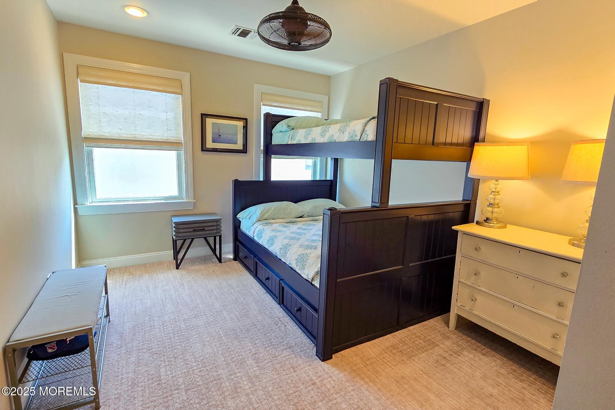 1604 Baltimore Avenue Lavallette, NJ 08735 - Photo 40 of 76 a bedroom with a bed and a window