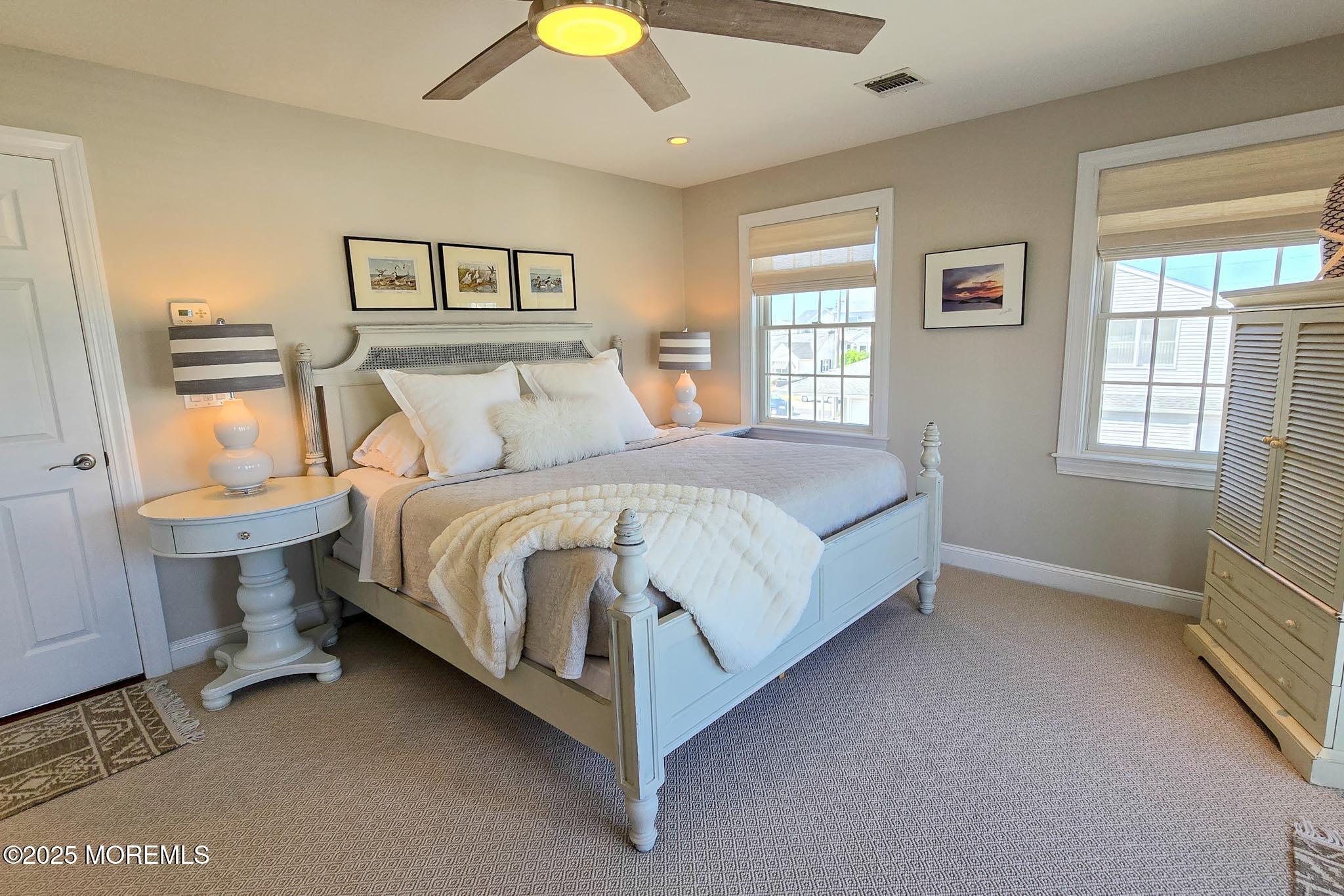 1604 Baltimore Avenue Lavallette, NJ 08735 - Photo 46 of 76 a bed room with a bed and a night stand