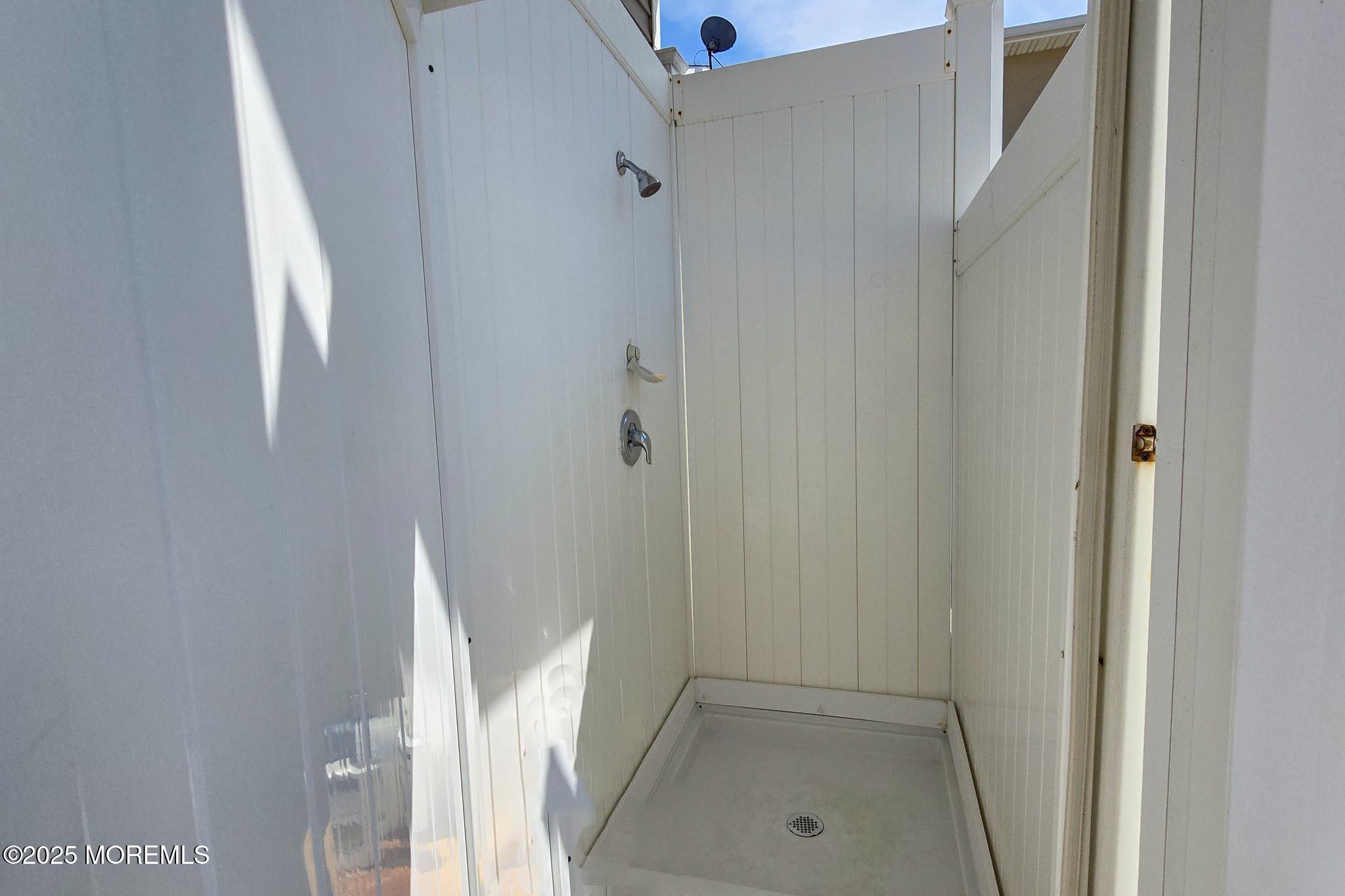 1604 Baltimore Avenue Lavallette, NJ 08735 - Photo 58 of 76 a bathroom with a shower