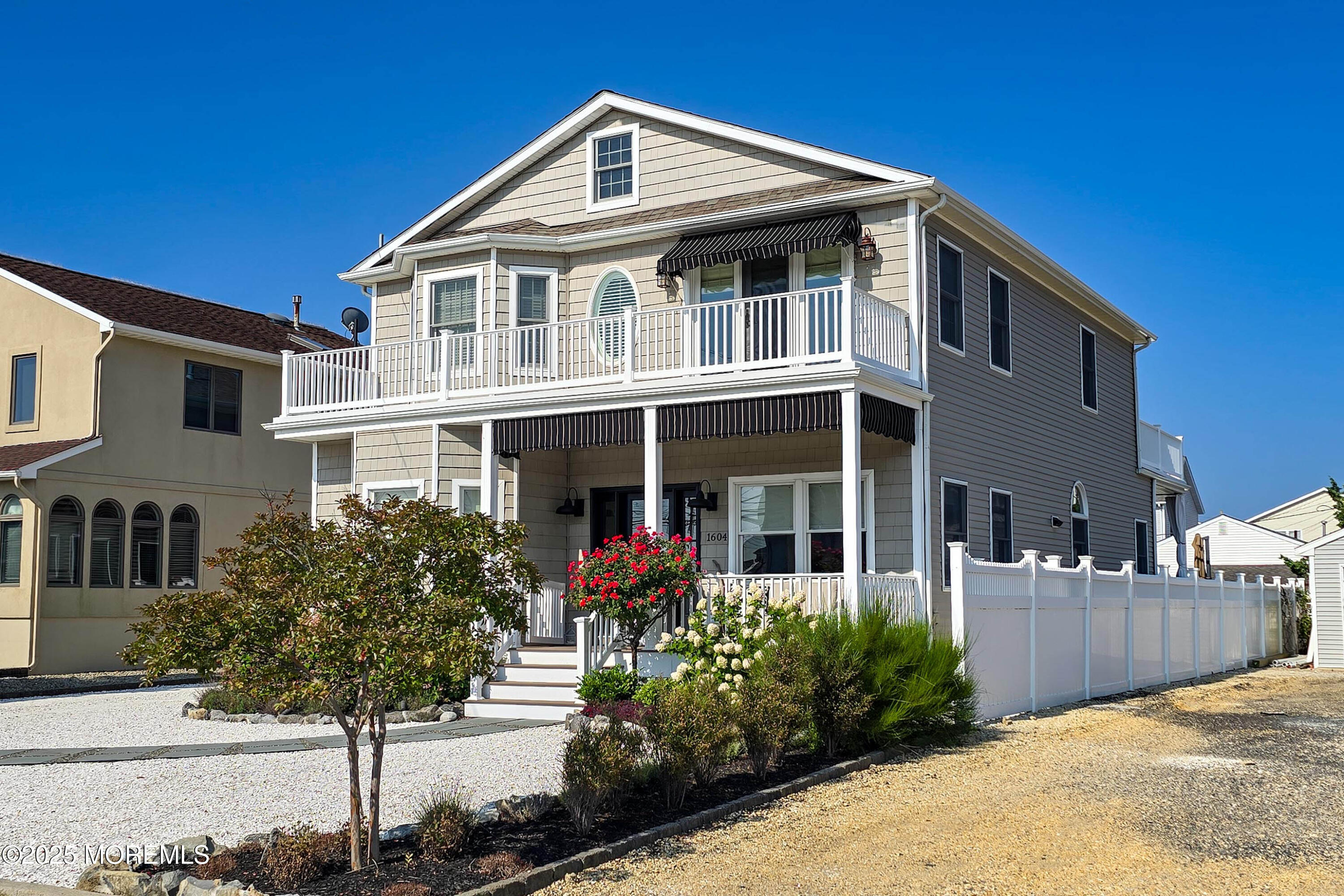 1604 Baltimore Avenue Lavallette, NJ 08735 - Photo 61 of 76 a front view of a house with garden