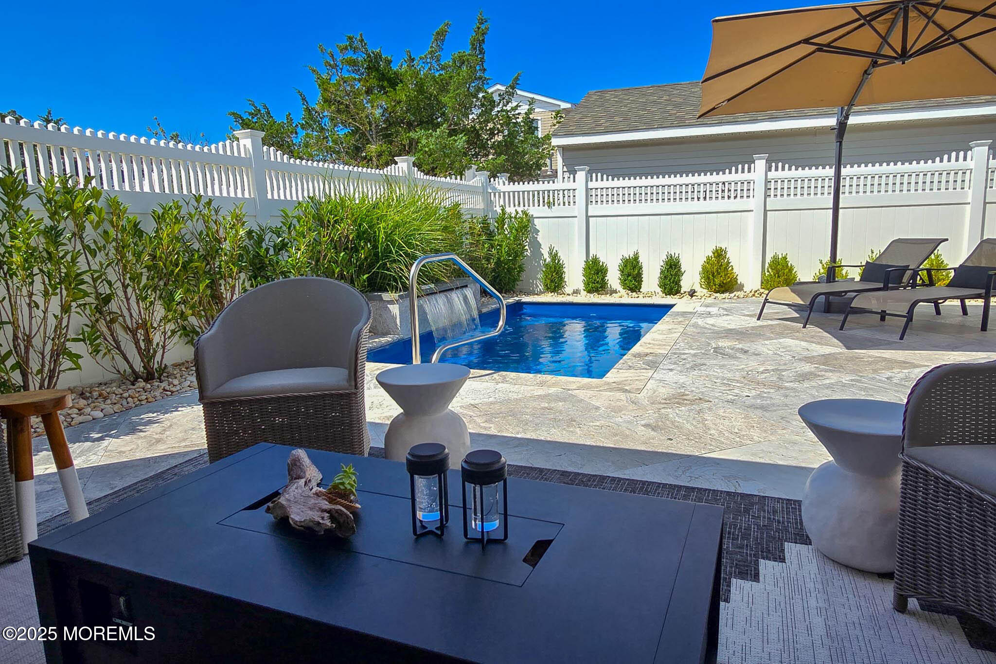 1604 Baltimore Avenue Lavallette, NJ 08735 - Photo 10 of 76 a view of a patio with table and chairs potted plants with wooden floor