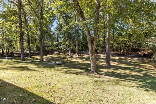 a view of a swimming pool with an outdoor space