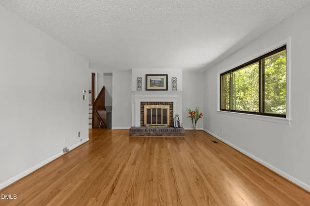 a view of a livingroom with wooden floor