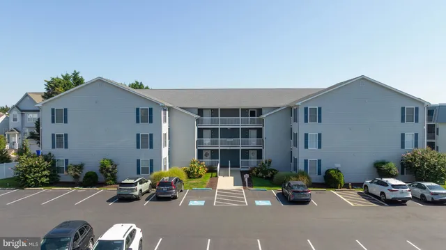 a car parked in front of a house