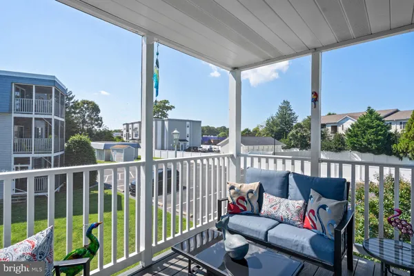 a view of a chairs in the roof deck