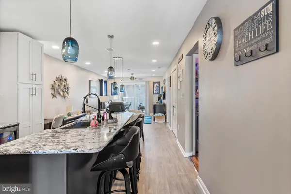 a very nice looking dining room with a table and chairs