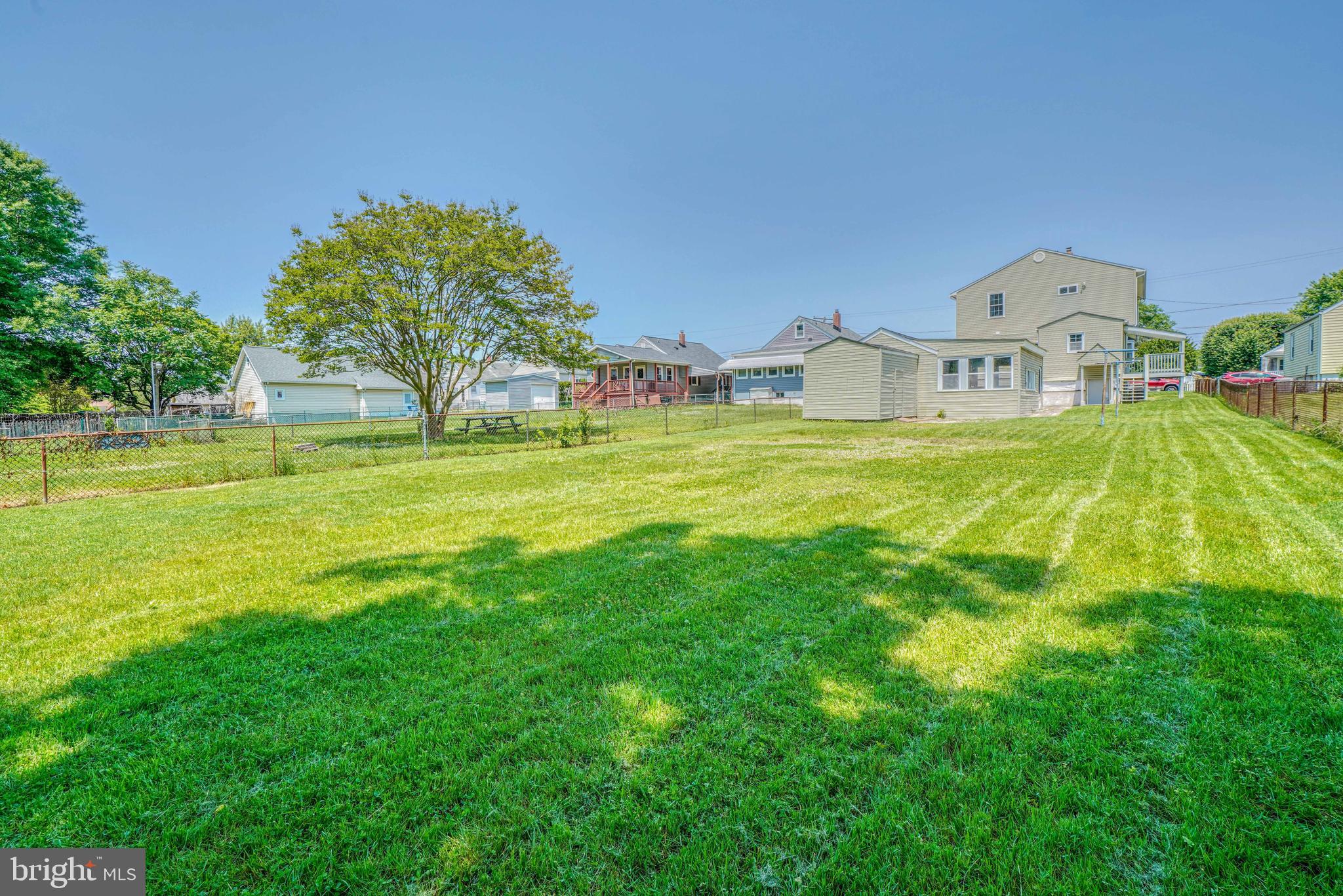 1303 Willow Road Dundalk, MD 21222 - Photo 65 of 68 Large Yard that backs to Bread and Cheese Creek
