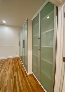 a bathroom with a bathtub and shower