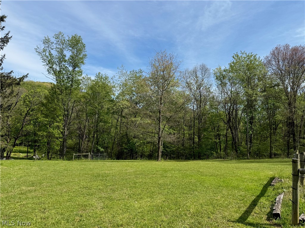 11811 Gaston Road Rogers, OH 44455 - Photo 22 of 38 You've got several acres of usable space, pole barns, and a Quonset Hut (currently used for recreation). Take advantage of the room to play, and play!!