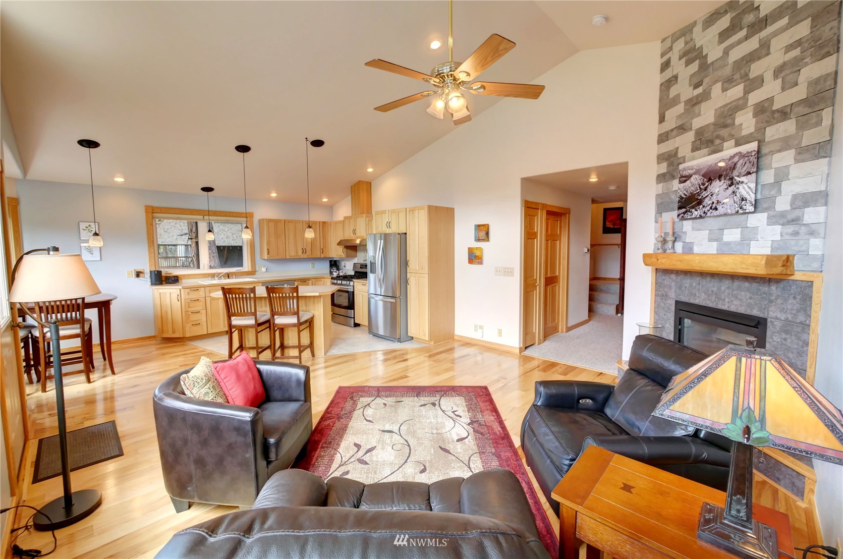21 Bitterbrush Road Winthrop, WA 98862 - Photo 31 of 40 a living room with furniture and a fireplace