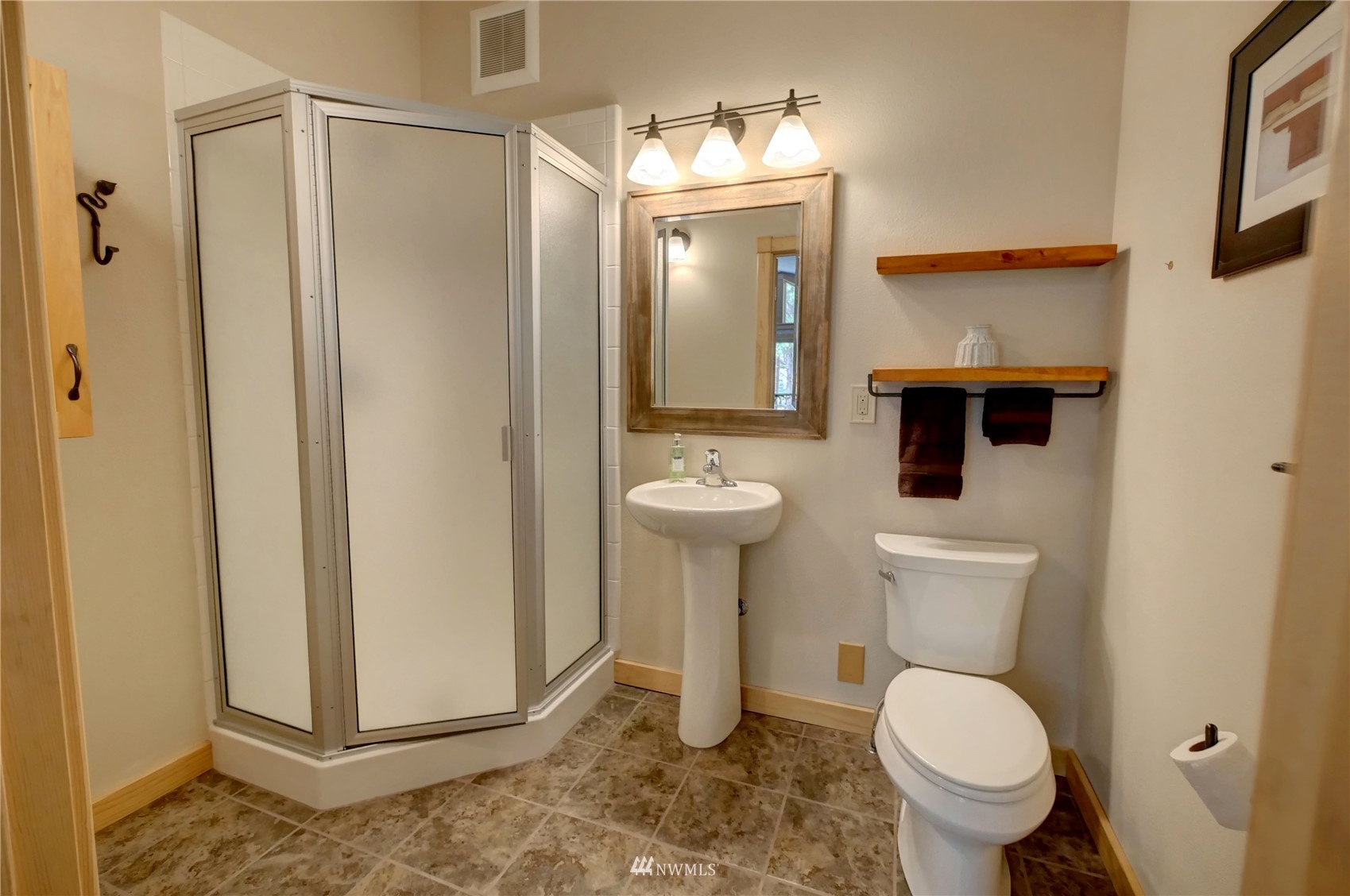 21 Bitterbrush Road Winthrop, WA 98862 - Photo 34 of 40 a bathroom with a toilet a sink and mirror