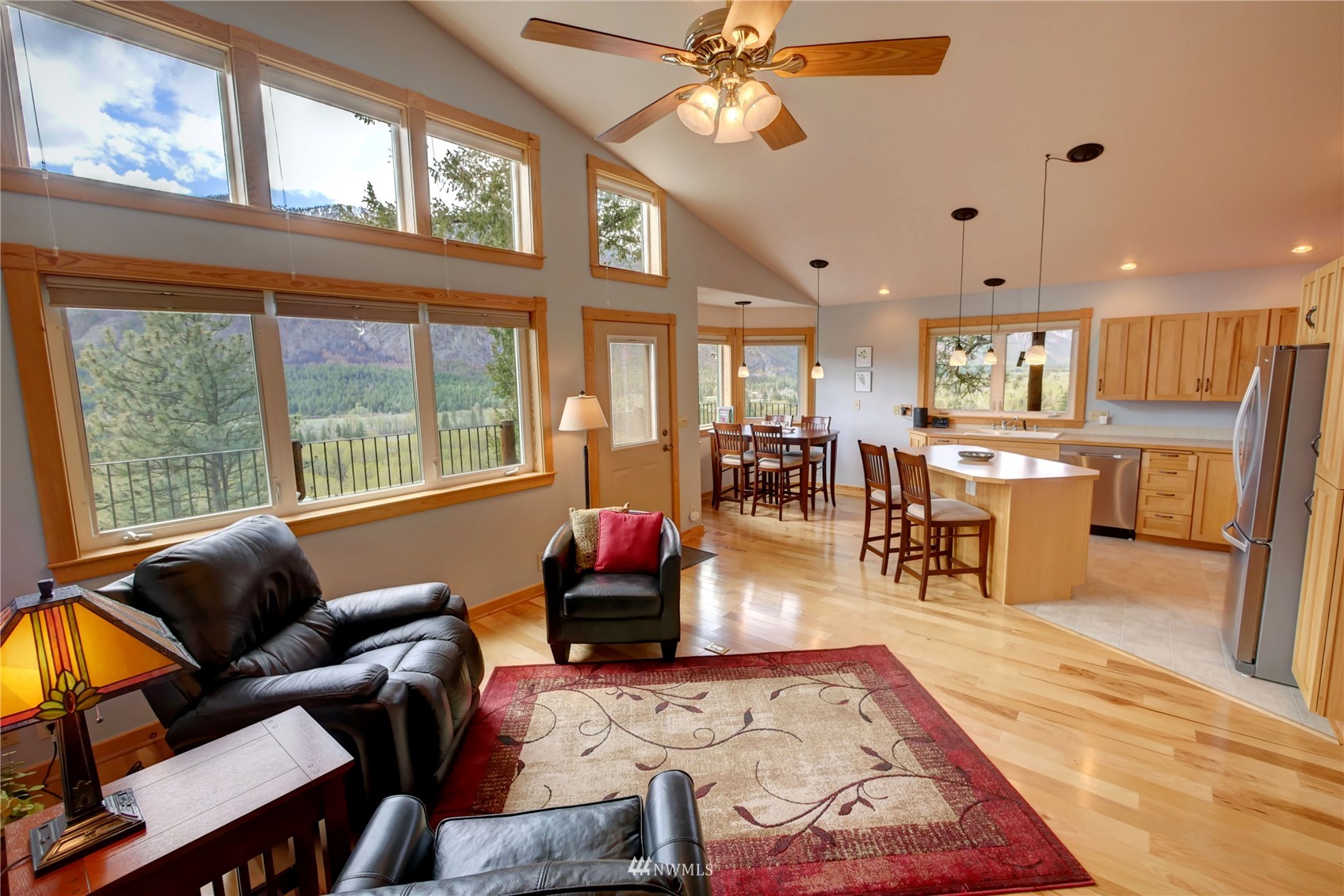 21 Bitterbrush Road Winthrop, WA 98862 - Photo 4 of 40 a living room with stainless steel appliances furniture a rug and a large window