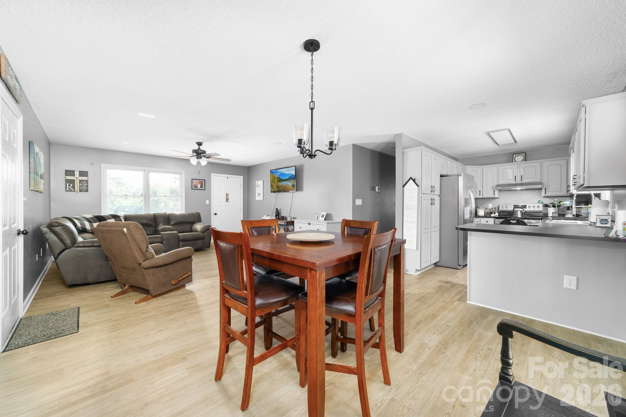 248 Jack McKinney Road Forest City, NC 28043 - Photo 21 of 29 a view of a dining room with furniture