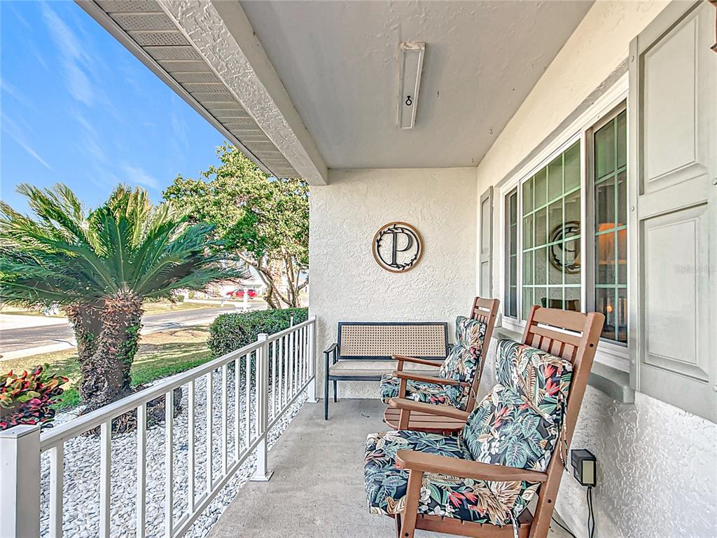 5226 Northwest 21st Loop Ocala, FL 34482 - Photo 3 of 57 a view of a chairs and table in the balcony