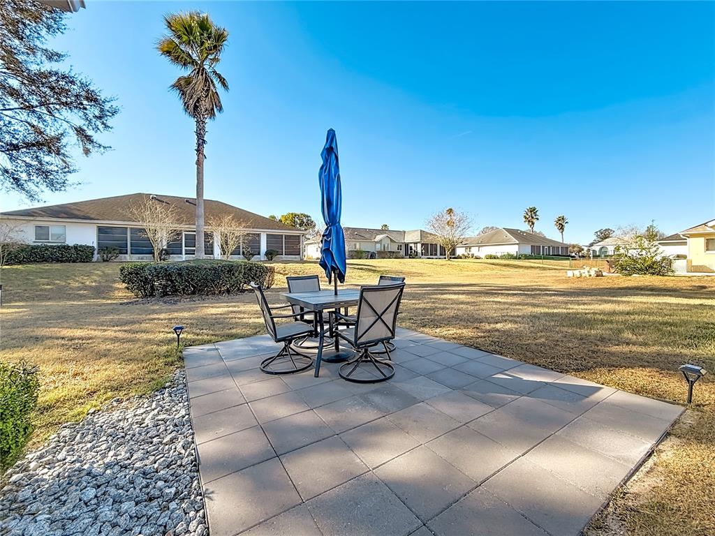 5226 Northwest 21st Loop Ocala, FL 34482 - Photo 33 of 57 a view of a terrace with chairs