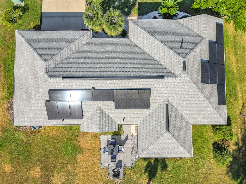 5226 Northwest 21st Loop Ocala, FL 34482 - Photo 36 of 57 a view of a house with a patio