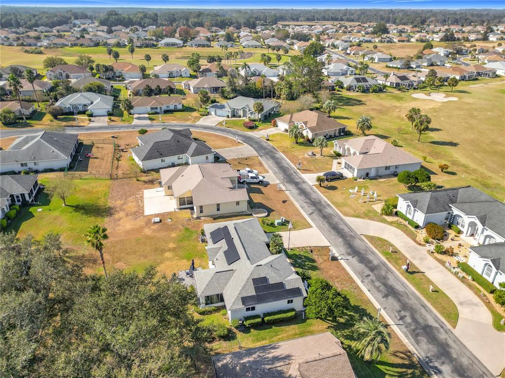 5226 Northwest 21st Loop Ocala, FL 34482 - Photo 48 of 57 an aerial view of residential houses with outdoor space