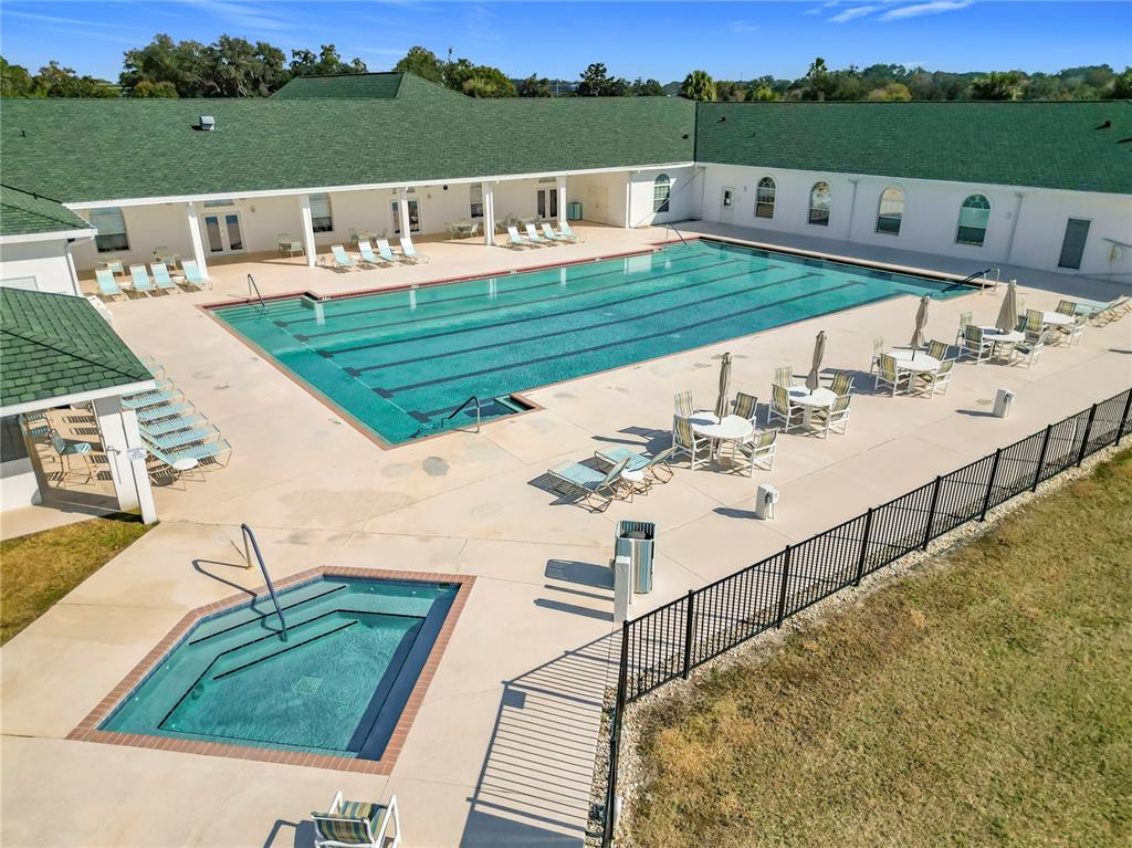 5226 Northwest 21st Loop Ocala, FL 34482 - Photo 52 of 57 a view of a house with pool and chairs