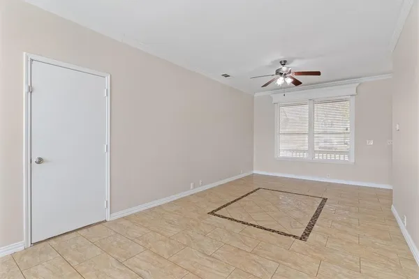 a kitchen with a stove a sink and cabinets