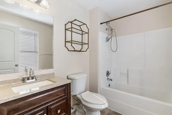 an empty room with closet area