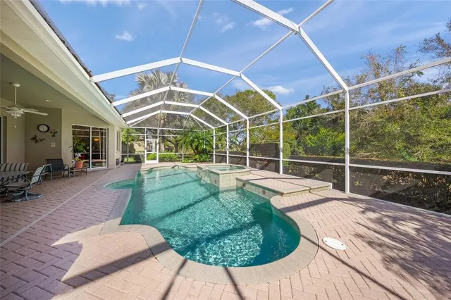 a view of green field with trees