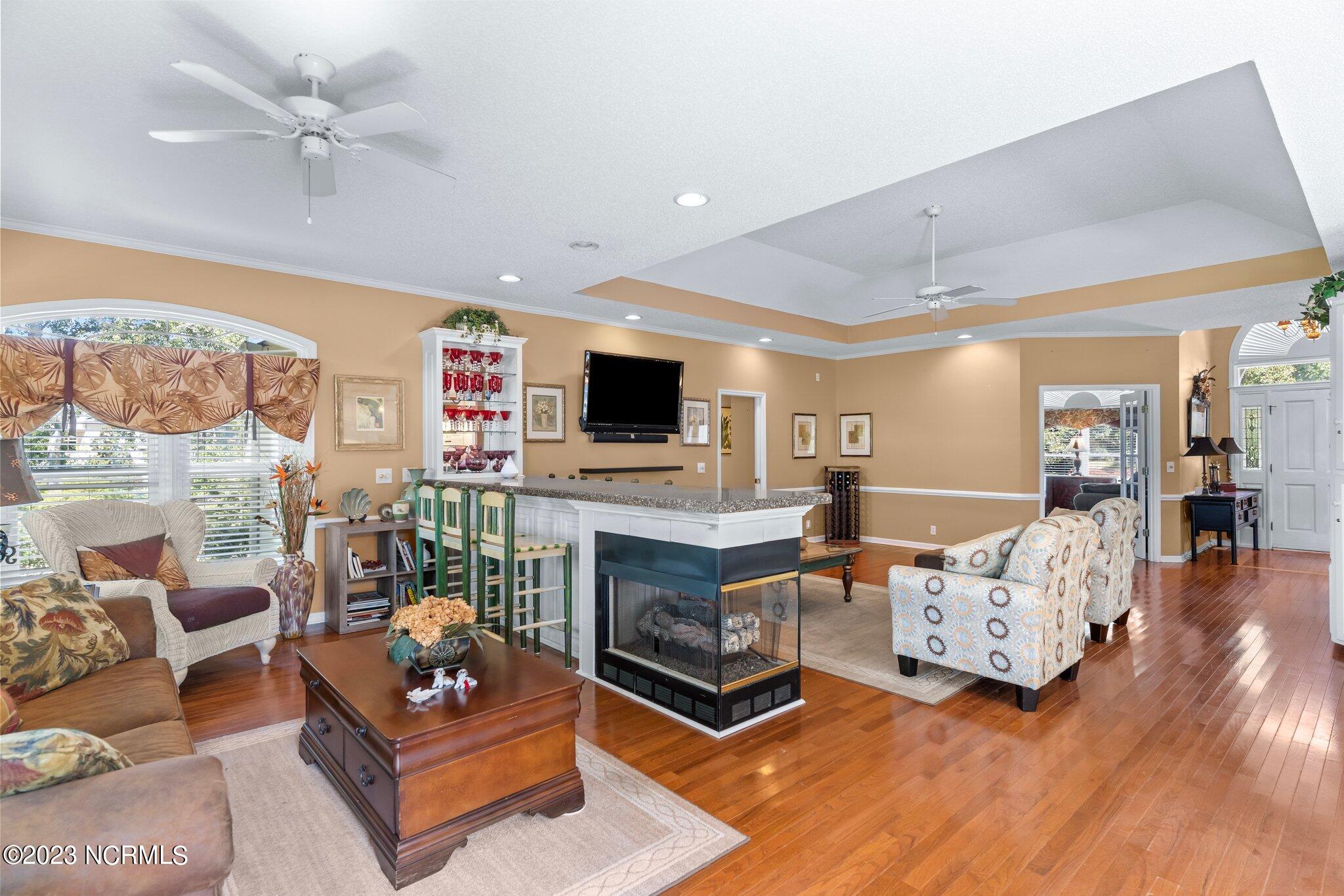 209 Rice Mill Circle Sunset Beach, NC 28468 - Photo 15 of 53 Great Room & Carolina Room