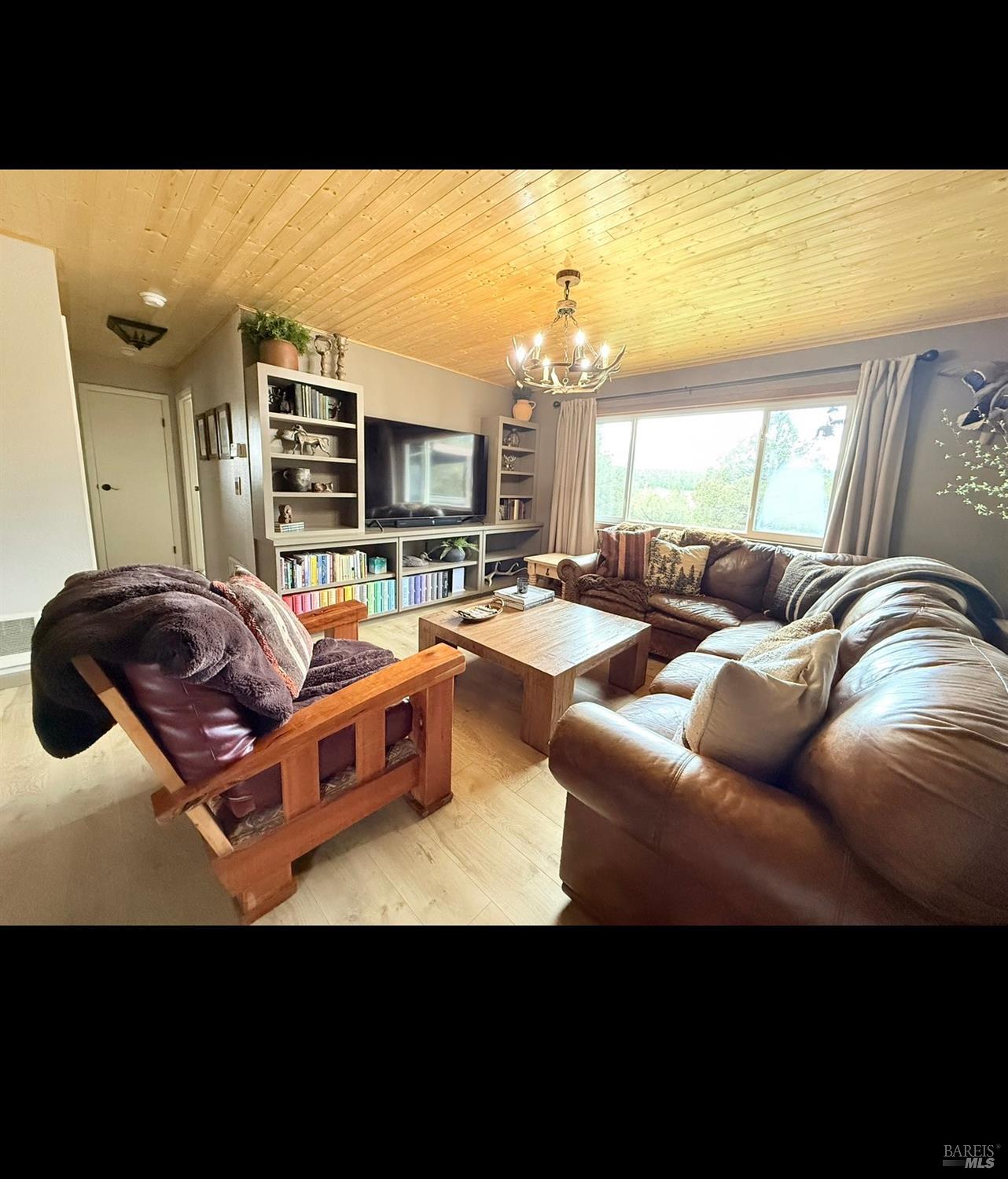 3004 Pencil Road Alturas, CA 96101 - Photo 12 of 40 a living room with furniture and a large window