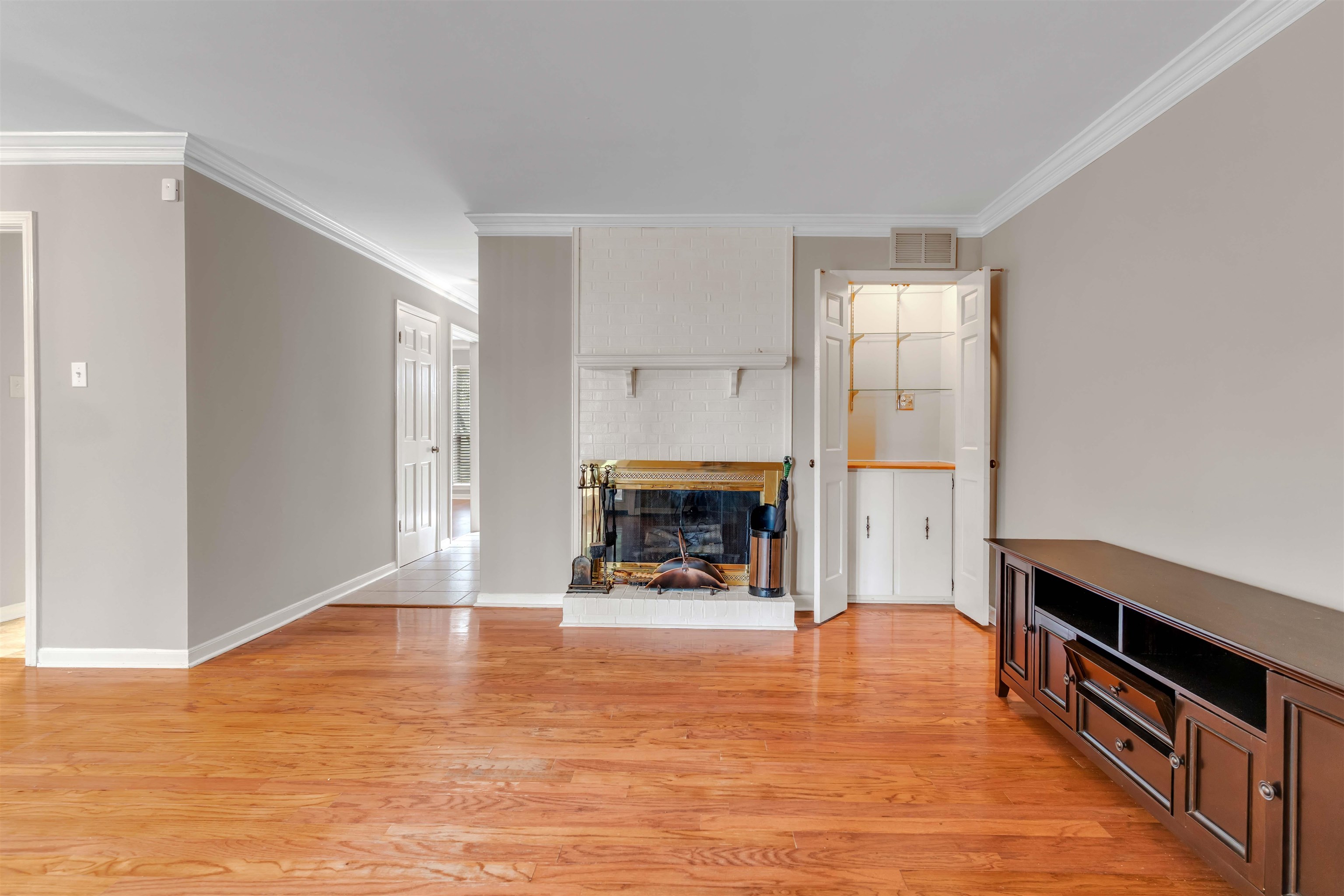 6942 Amberly Road, Unit 6942 Memphis, TN 38119 - Photo 14 of 32 a view of an empty room with a fireplace